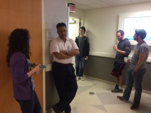 Professor and Students in hallway