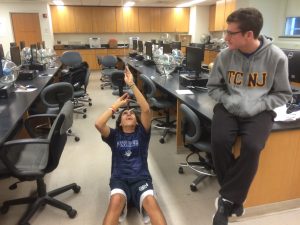 Students messing around in Physics classroom